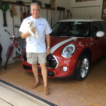 Organized garage with Mini Cooper and wall tool storage - Mick from Boynton Beach, Fl