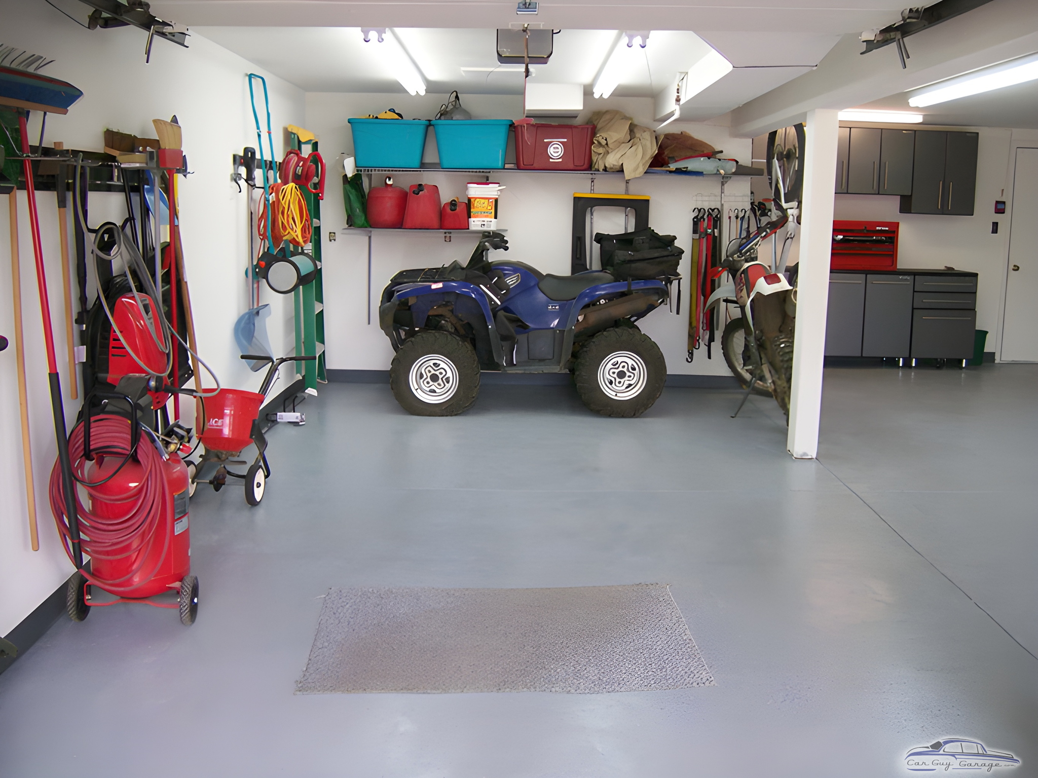 Organized garage with ATV, cabinets, and wall storage - Peter from Lakewood, CO
