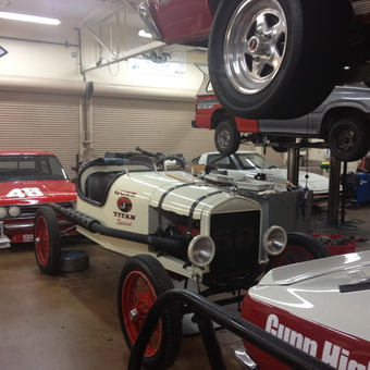 Classic Cars, Garage Lift, and Tools in Gunn High School Autoshop