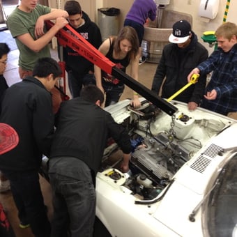 Students Using Engine Hoist and Tools in School Autoshop - Gunn High School Autoshop