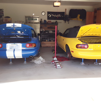 Garage with Two Miatas on Jack Stands and Tools - Maury from Port Orchard, WA