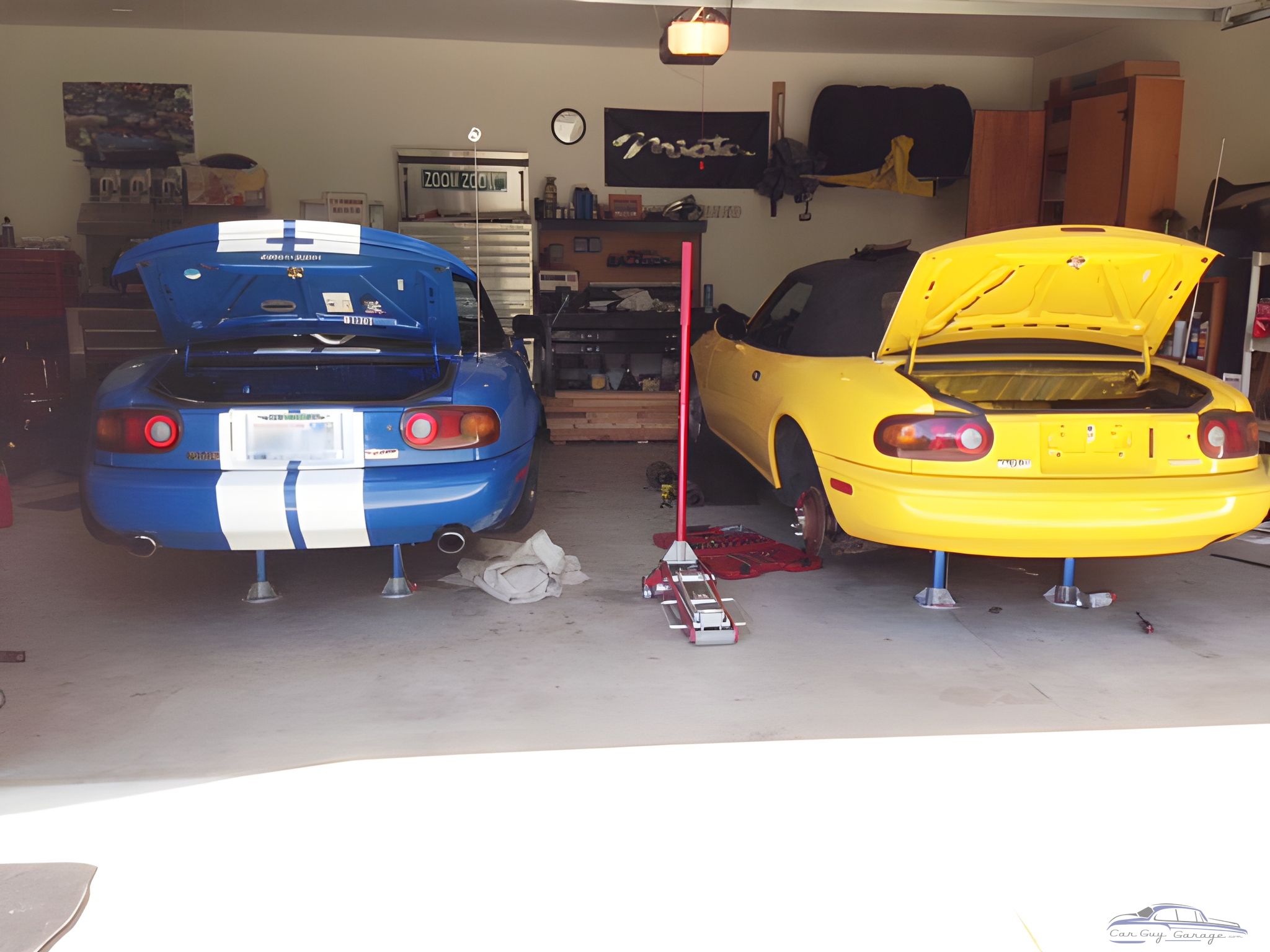 Garage with Two Miatas on Jack Stands and Tools - Maury from Port Orchard, WA