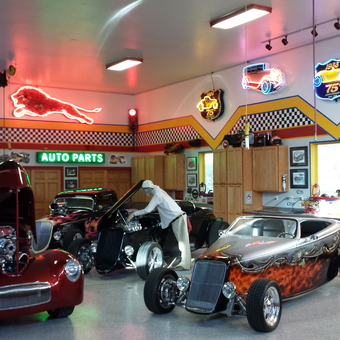 Hot rod garage with neon signs and custom cars - Sparkys Hot Rod Garage from Loomis, Ca