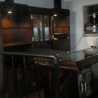 Home garage bar with wood cabinets and vintage phone - Hemicanuck from CANNINGTON, ON