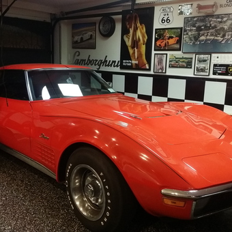 Classic Red Corvette in Decorated Garage - Snowmanmart from Baldwin, New York