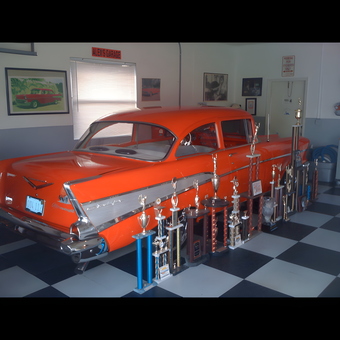 Classic Car Display with Trophies in Checkered Garage - Alex from Pembroke Pines, FL