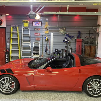 Organized garage with Corvette, ladders, and wall storage - Gregg's Garage from Cary, IL