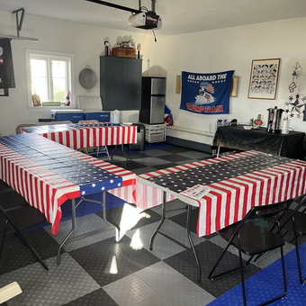 Patriotic garage setup with folding tables and chairs - Ed from Wakefield, MA