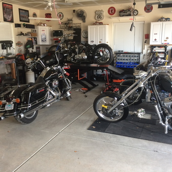 Motorcycle Garage with Lift, Tool Cabinets, and Wall Decor - Al from Reno