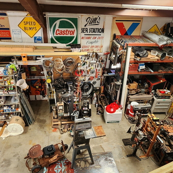 Organized garage with tools, signs, and shelving - Big Red from Edgewood, TX
