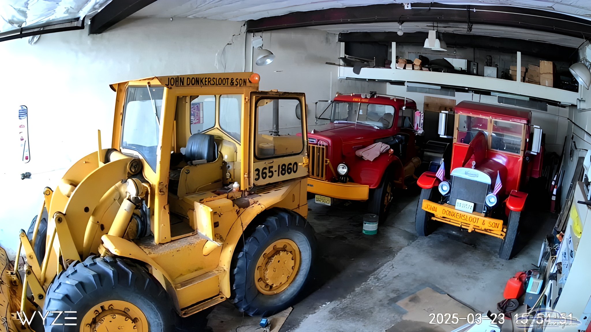 Classic Trucks and Loader in Organized Garage - John from Clifton, NJ