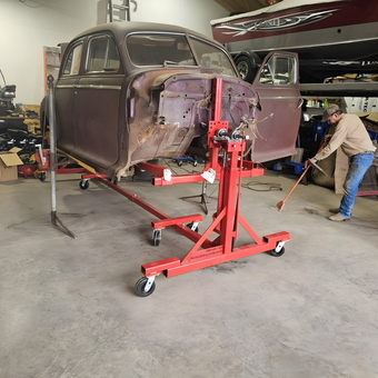 Classic Car Body on Rotisserie in Organized Garage - 1941 chivy from Watford city, ND