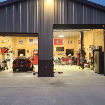 Spacious garage with car lift, tool chests, and decor - Jeremy from CLARKSVILLE