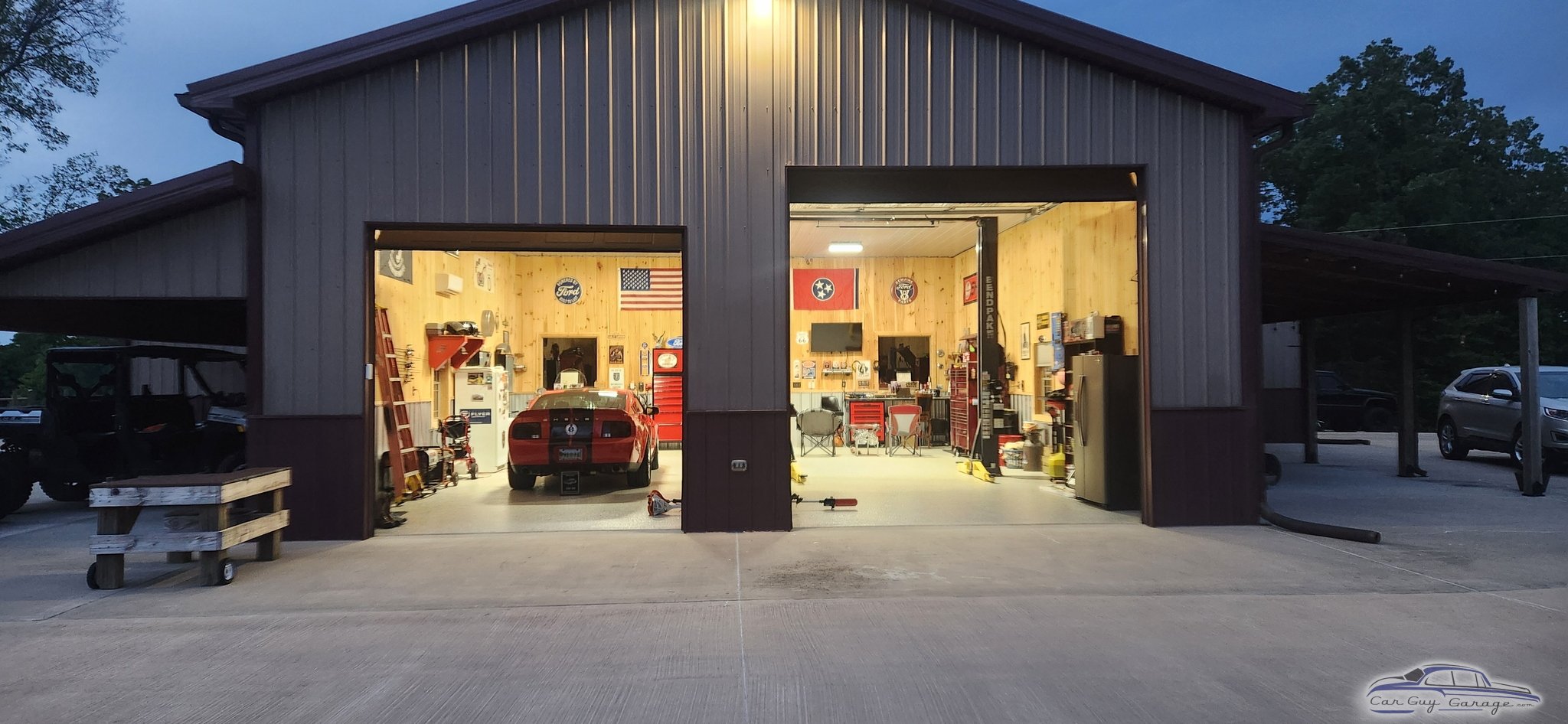 Spacious garage with car lift, tool chests, and decor - Jeremy from CLARKSVILLE