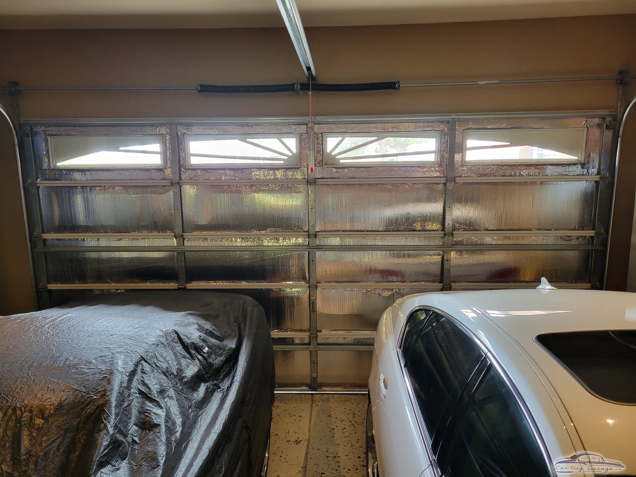 Insulated Garage Door With Covered and Parked Cars