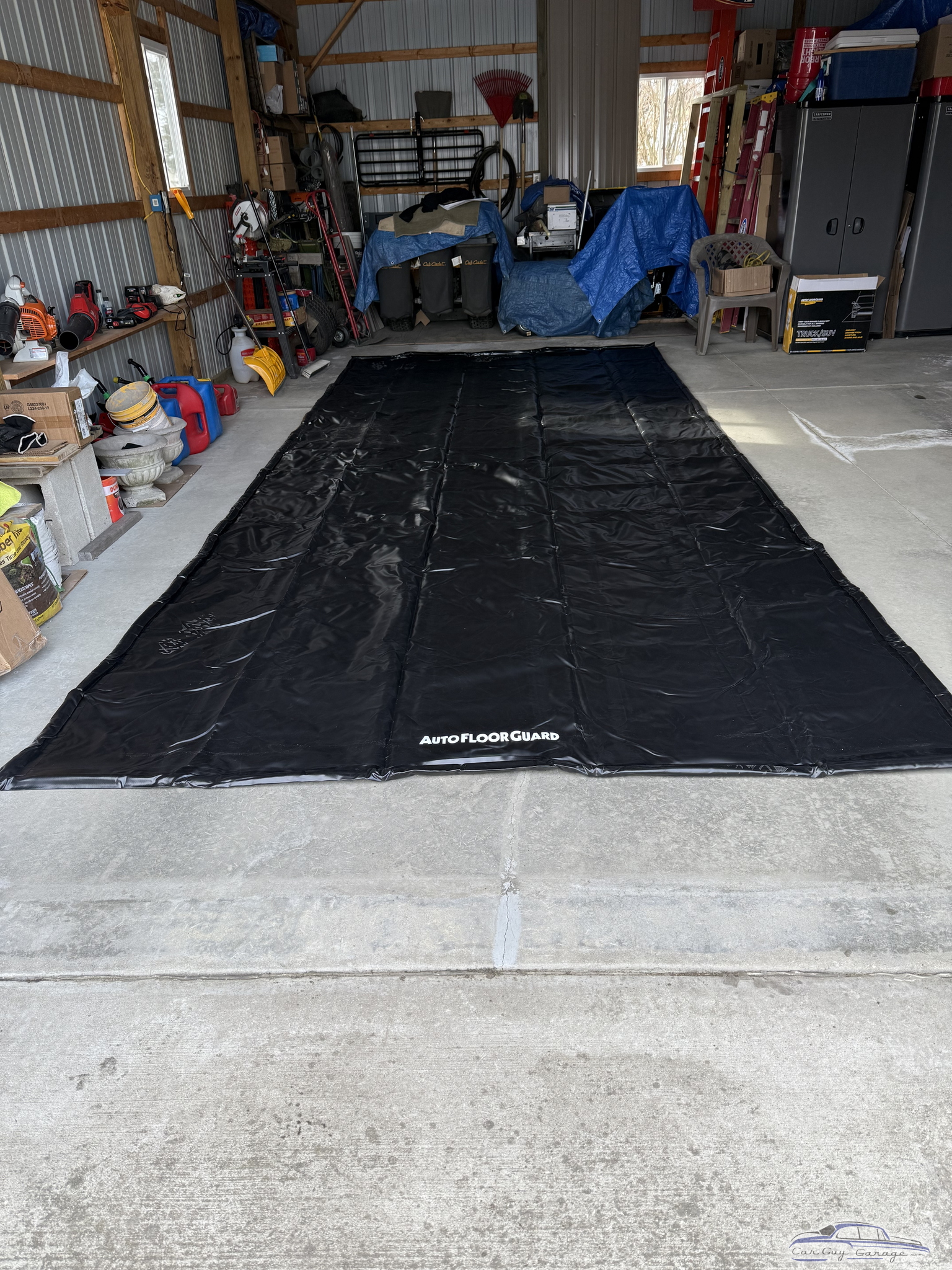 AutoFloorGuard Garage Containment Mat with Storage Cabinets and Tools