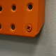 Two Orange Powdercoated 16" x 32" Metal Pegboard Two Orange Powdercoated 16" x 32" Metal Pegboard