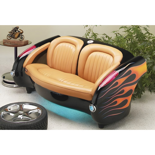 1957 Blazing Black Flames Corvette with Tan Leather Couch