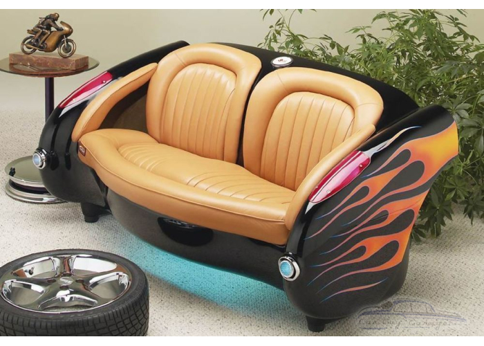 1957 Blazing Black Flames Corvette with Tan Leather Couch