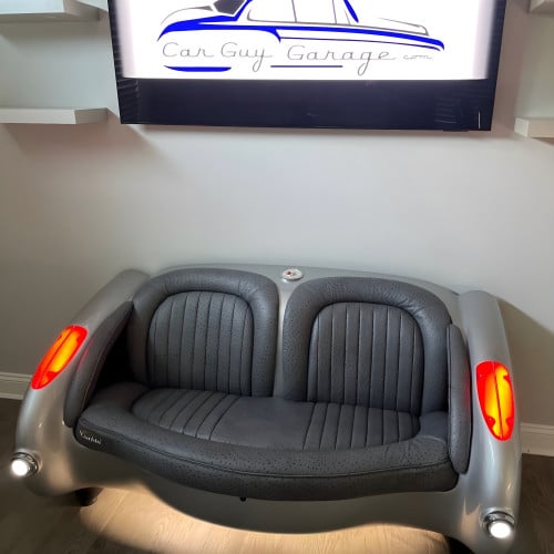 1957 Gunmetal Gray Corvette with Black Leather Couch