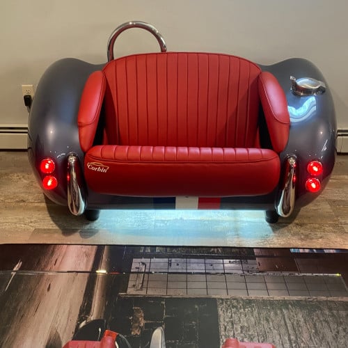 Metallic Silver Cobra with Red Leather Couch