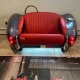 Metallic Silver Cobra with Red Leather Couch Metallic Silver Cobra with Red Leather Couch