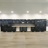 Black Modular 16-Piece Garage Cabinet Set with Dual Workstations