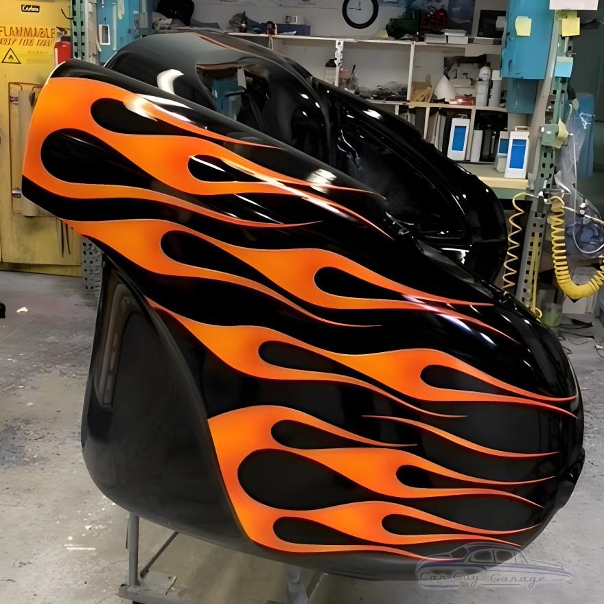 1957 Blazing Black Flames Corvette with Tan Leather Couch 1957 Blazing Black Flames Corvette with Tan Leather Couch