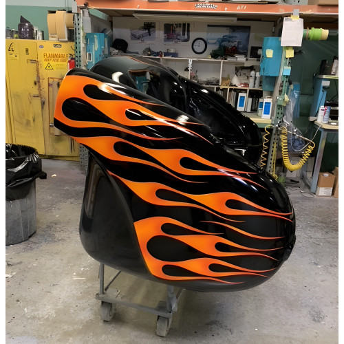 1957 Blazing Black Flames Corvette with Tan Leather Couch
