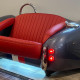 Metallic Silver Cobra with Red Leather Couch