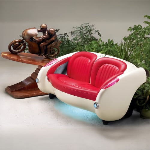 1957 Vibrant White Corvette with Bright Red Leather Couch