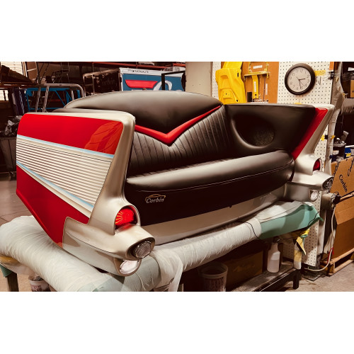 Red 1957 Chevy with Black Couch