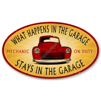 Stays in the Garage Oval Metal Sign - 14" x 24"